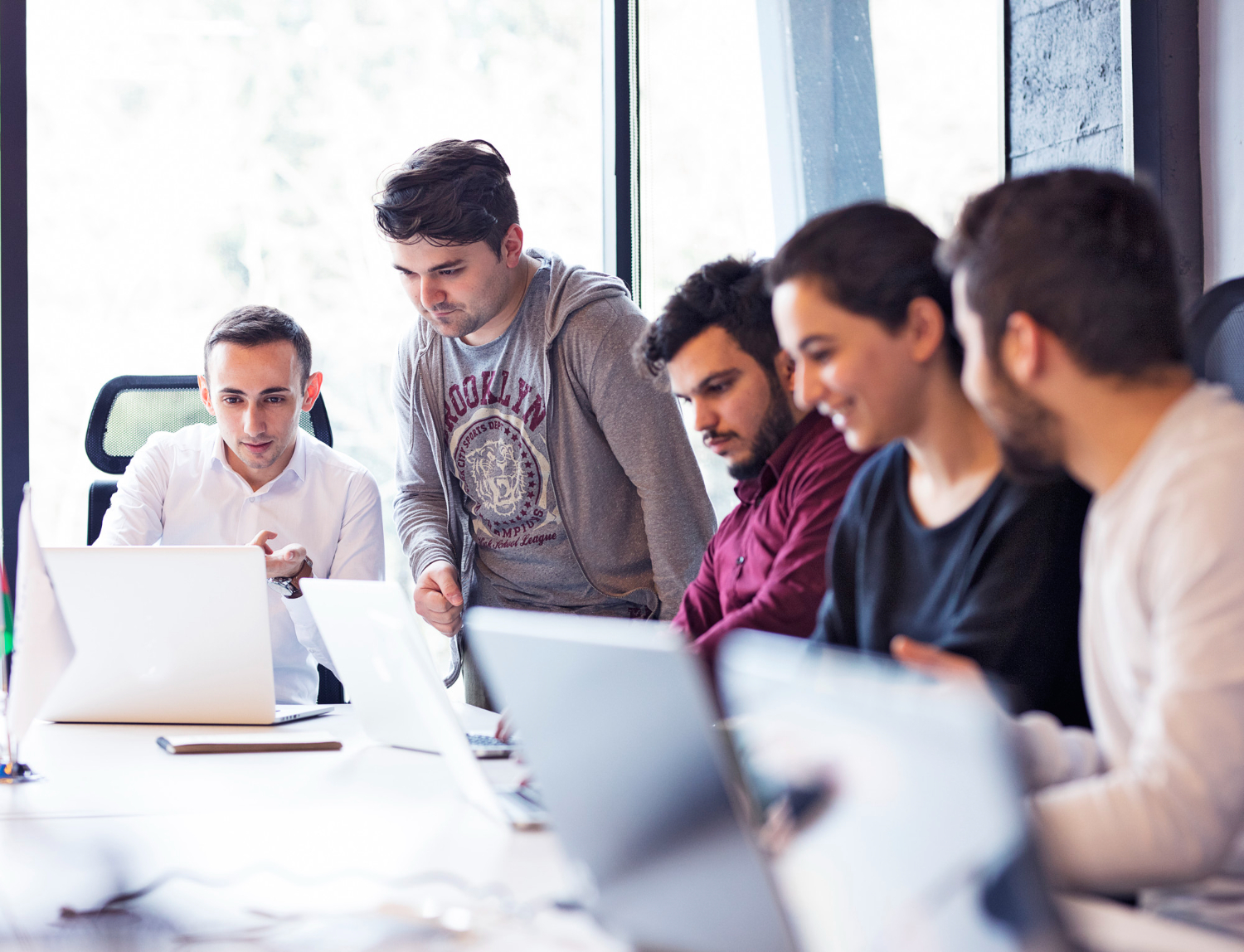 Corporate team collaborating in a professionally managed office workspace
