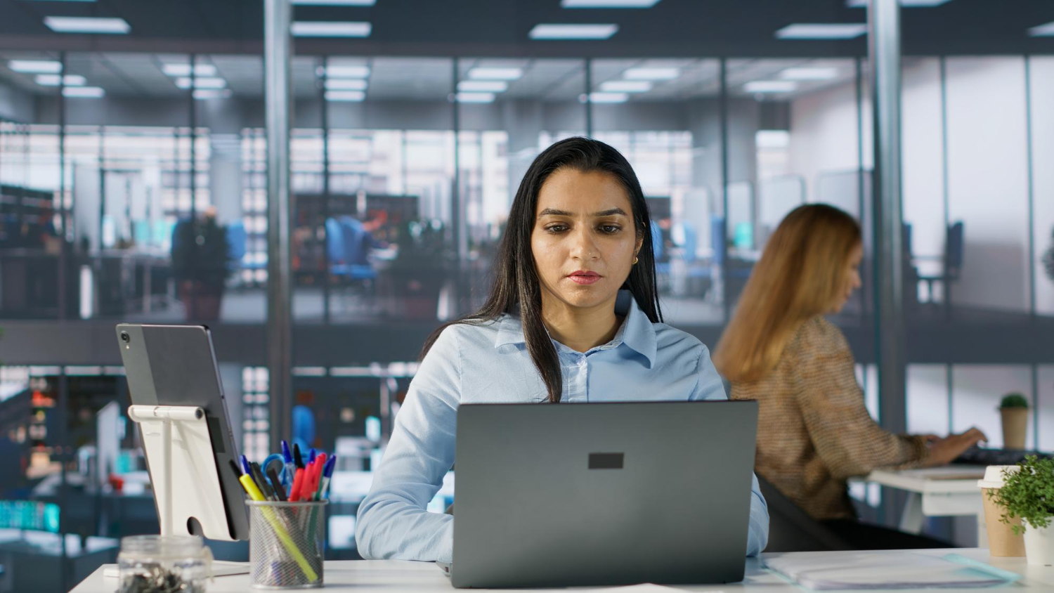 Managed workplace operations across a modern open-plan corporate office floor